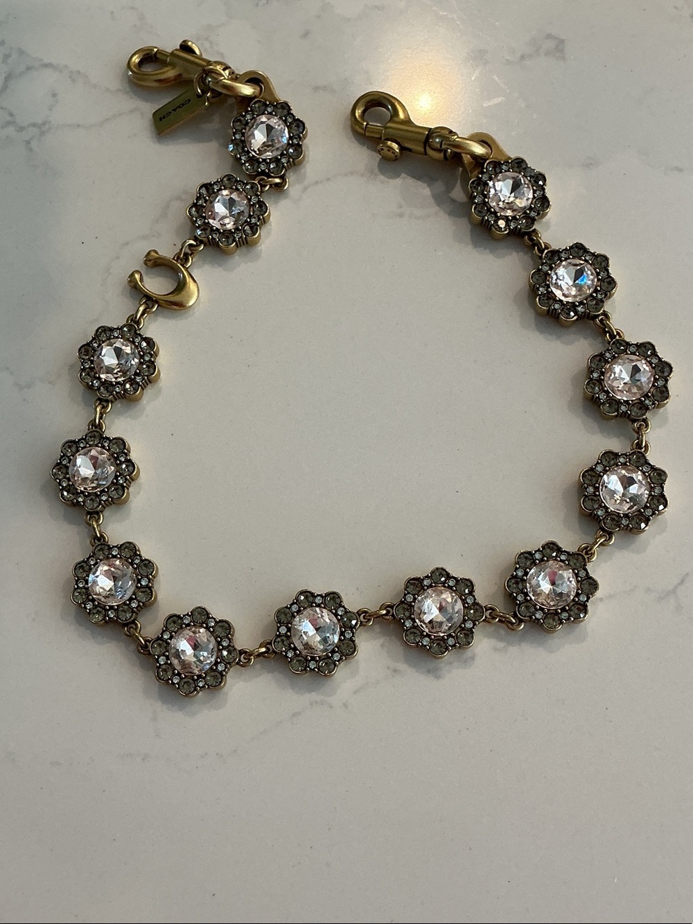 Coach Gold and Clear Crystal Flower Link Bracelet